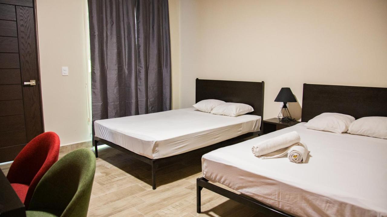 Esduma Iguanas Hotel Плая дел Кармен Екстериор снимка